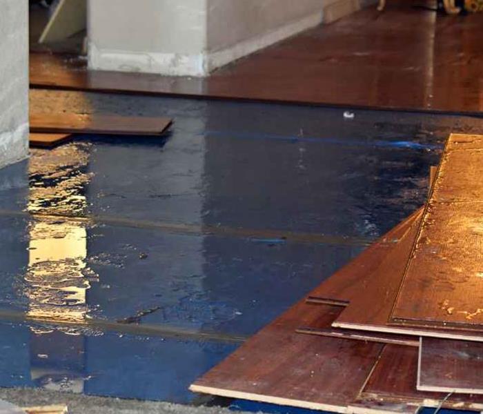 A floor with water damage